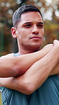 Fitness, man and stretching arms outdoor for health, wellness and exercise preparation. Warm up muscle, runner and person at park for practice, start training and getting ready for workout in nature