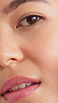 Beauty, face and skincare with woman in studio for facial, self care and aesthetic. Dermatology, glow treatment and collagen shine with closeup of female person for grooming, texture and hydration