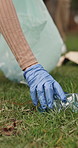 Park, plastic or hands with trash bag for cleaning, land pollution or ngo recycling drive for climate action. Grass, rubbish or person with eco conservation project, pick up litter or sustainability