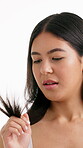 Split ends, beauty and hair with woman in studio for self care, growth fail and worry. Keratin treatment crisis, stress and repair problem with person on white background for elasticity and check