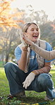 High five, volunteer or woman with smile in park, green initiative or environment restoration support. Nature, ngo people or gardening success for reforestation project, sustainability or celebrate