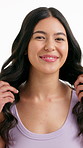 Happy woman, face and studio with haircare for curls, style or treatment on a white background. Portrait, female person or smile with hair shine, glow or wavy smooth for wash, blowout or salon