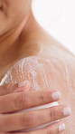 Woman, hands and washing with soap for skincare, shower or personal hygiene on a studio background. Closeup, female person or cleaning with dermatology or beauty wellness for smooth or gentle skin
