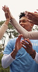 Applause, high five and laughing with volunteer team outdoor together for donation success. Charity, fist pump and support with group of funny people in park for community outreach goals or target