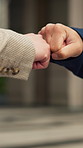 Business people, meeting and city with fist bump for partnership, agreement or outdoor deal. Employees, colleagues or touch with introduction or greeting for onboarding, teamwork or b2b in urban town