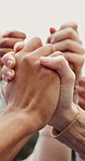 Team building, people and holding hands outdoor for support, solidarity and synergy for connection. Group, collaboration and trust with cooperation at park, community mission and association together