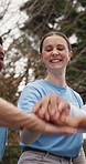 Outdoor, happy women and hand stack with volunteers, solidarity and celebration for charity success. Park, community service and people with smile for achievement, low angle and clapping in nature