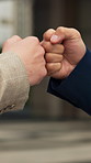 Business people, meeting and city with fist bump for agreement, outdoor deal or partnership. Employees, colleagues or touch with introduction or greeting for onboarding, teamwork or b2b in urban town