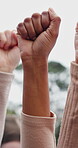 Protest, fist or hands outdoor with power symbol, unity or activism in human rights rally. Solidarity, group of people with strength gesture, advocacy or empowerment icon in social justice movement. 