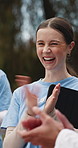 Happy woman, volunteer and tablet with team applause for outdoor outreach or community service. Excited, female person or NGO group clapping with smile or technology for charity or success in park