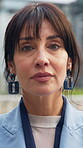 Commute, face and businesswoman with ambition in city, serious or pride for public relations career. Outdoor, brand manager and mature person with confidence for job opportunity, portrait and travel