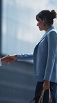 Business, handshake or women with smile in city, introduction or partnership for property development. Greeting, shaking hands or people with joint real estate venture, teamwork or urban project deal