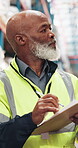 Logistic, inspection or black man in depot with clipboard, stock or inventory management of shipment. Distribution, review or mature supplier with note, order track or cargo checklist in supply chain