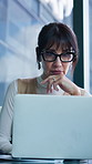 Businesswoman, reading and email in office with laptop, HR administration and planning calendar agenda. Human resources worker, mature person and thinking with computer, review schedule and glasses.