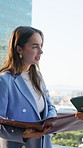 Team, documents and businesswoman with tablet in city, reading and planning for property investment. Outdoor, collaboration and people with tech for real estate listing, serious and talk with report