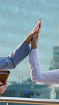 Balcony, business and women with high five in city, funny conversation or celebration for investment. Winning, achievement or happy people with venture project success, laugh or support for teamwork