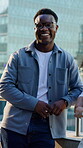 Face, city or black man with smile on balcony, property development industry or pride for opportunity. Portrait, laugh and happy employee with confidence for urban planning, about us and real estate