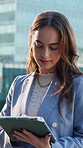 City, development and tablet with designer woman on rooftop for planning, review or scrolling. App, design and research with employee outdoor in urban town for agenda, online calendar or schedule