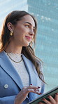 City, tablet and thinking with designer woman on rooftop for planning, review or scrolling. App, design and smile with happy employee outdoor in urban town for agenda or schedule inspiration