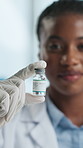 Black woman, doctor or hands with vial in hospital for cure, monkeypox virus or disease. Portrait, female person or healthcare worker with sample, antibiotic or vaccine for viral infection or illness