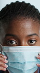 Black woman, face and medical mask with protection for bacteria, germ or viral disease. Portrait, female person or nurse getting ready with mouth cover for global pandemic, health and clinic safety