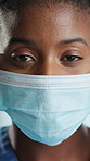 Happy, black woman or face mask with protection for viral disease, health and safety in hospital. Portrait, female person or nurse with mouth cover for pandemic, bacteria or germ prevention in clinic