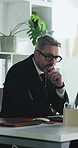 Thinking, typing or businessman with laptop in office, claim investigation or research for evaluation. Review, insurance broker or mature person with risk assessment report, reflection or computer