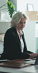 Thinking, business and woman with laptop in office, claim investigation and reflection for evaluation. Review, insurance broker and mature person with pc for risk assessment report, typing and glass
