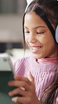 Headphones, smile and girl with tablet in house, gaming website and victory for online competition. Tech, winning contest and child with entertainment platform for playing, digital app and next level