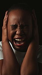 Angry, scream and woman with anxiety, mental health and stress for emotional abuse on black background. Face, studio and African person with depression, ptsd and crying for sad memories of trauma.