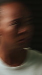 Black woman, blur and paranoid with stress for fear, trauma or claustrophobia in dark room. Female person, mental health or panic with bipolar disorder for schizophrenia, emotional abuse or psychosis