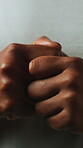 Fear, anxiety and hands of person with tapping, stress and overwhelmed reaction for phobia exposure. Scared, worry and woman with trauma for distress response, nervous habit and crisis for terror