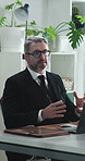 Mature, businessman and meeting with financial advisor for administration or assistance in office. Man, business agent or explaining terms and conditions with laptop for finance advice in workplace