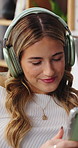 Laugh, tablet and woman with headphones in home for funny videos, online post and streaming. Relax, apartment and person on digital tech for internet humor, website or connection for watching podcast