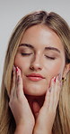 Makeup, beauty and woman in studio with soft face, glow and facial cosmetics for confidence. Manicure, natural skincare and female person with cosmetology for health or wellness by white background.
