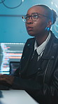 Woman, hacking and glasses in basement with computer, cyber attack plan and coding for network breach. Hacker, black person and typing with desktop, thinking and research dark web for phishing scam.