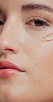 Beauty, skincare and serum with face of woman for dermatology, self care and collagen. Glow cosmetics, hydration and cosmetology with closeup of female person for dropper, clear skin and moisturizer