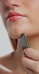 Beauty, skincare and gua sha with jaw of woman for dermatology, self care and collagen. Glow cosmetics, lymphatic drainage and cosmetology with closeup of person for facial tool, sculpting and detox