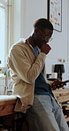 Typing, smile and black man in kitchen, phone for online chatting and app for funny video. Home, mobile user or African person with tech for texting, laughing or scroll for entertainment or happiness
