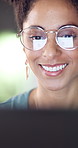 Glasses, online and happy woman with laptop for project, laughing or ad campaign for brand awareness. Office, social media specialist and person with tech for assignment, digital marketing and bokeh