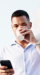 Walking, phone and man with coffee in city for social media, online chat and email on morning commute. Business, happy and low angle of person with cellphone, drink and travel in town with connection
