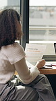 Business, woman and lawyer with document in office for leadership, governance or compliance form. Back, female attorney and reading paperwork for legal requirement, risk management and fiduciary duty