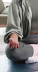 Meditation, hands and woman in home with lotus pose for balance, mental wellness and health. Apartment, morning and person on yoga mat for breathing exercise mindfulness and calm mindset on floor