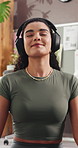 Happy woman, headphones and music for meditation, home and stress relief with ambient sound on break. Calm, person and healing mental health with audio, inner peace and wellness on weekend in house