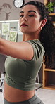 Stretching, balance and woman in home for yoga, exercise and mental health in morning. Apartment, mindfulness and person with fitness routine for wellness, mobility and active hobby in living room