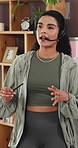 Remote work, fitness and woman in home, headset for communication and virtual coaching. Instructor, entrepreneur and person in lounge, talking and consultation with online exercise, tips and advice