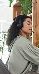 Remote work, call center and woman with headset for consultation and contact us for help desk. Person, home and professional in lounge, communication and customer support for advice and feedback