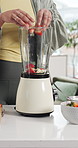 Hands, blender and fruit in home for smoothie with healthy food, wellness and detox in kitchen. Person, appliance and diet with banana, strawberry and organic produce for nutrition at apartment