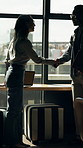Business people, meeting and handshake with team for merger, company partnership or b2b in office. Group, employees or colleagues shaking hands with introduction for onboarding agreement in workplace