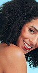 Face, smile and woman in studio with skincare, makeup cosmetics and grooming for beauty aesthetic. Happy, African person and body care with dermatology, wellness and glowing skin on blue background.